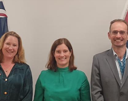 A group shot of 3 representatives of the meeting
