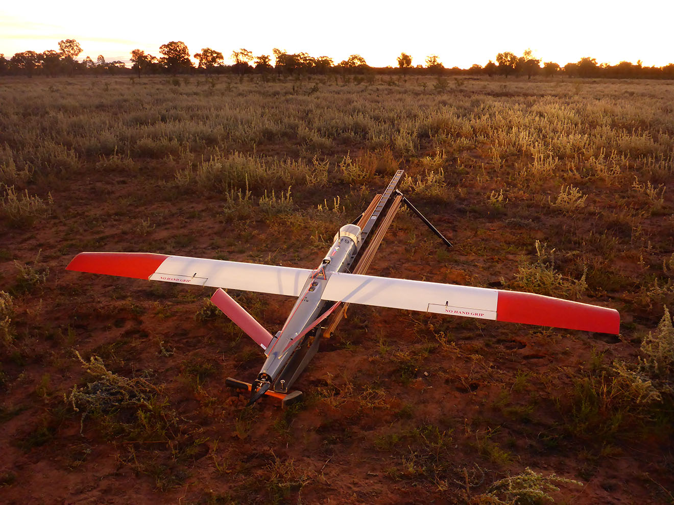 An uncrewed aerial vehicle that detects and manages biosecurity threats using infra-red technology.