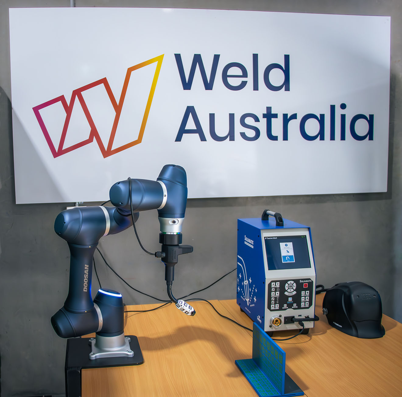 A cobot used with augmented reality to safely simulate welding. 