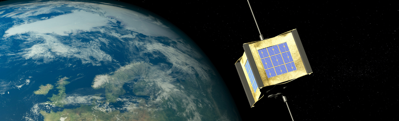 Small gold and blue box with wires floating in space with earth in background