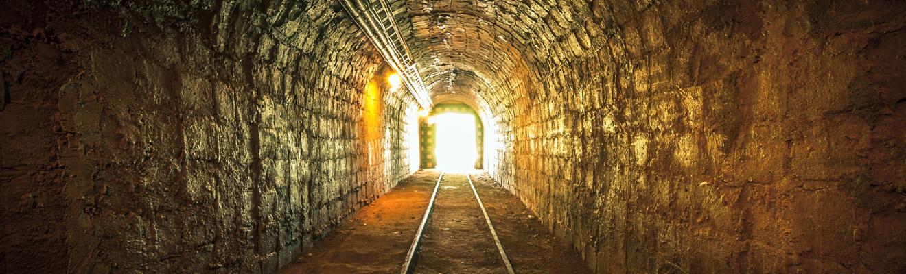 Photo looking along a mining rail tunnel