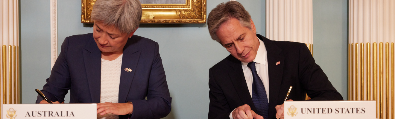 Minister for Foreign Affairs Penny Wong and US Secretary of State Antony Blinken signing the Landsat Next ministerial communique