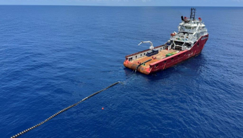 The Skandi Emerald, with a floating offtake hose loaded on its deck, ready for towing to Darwin