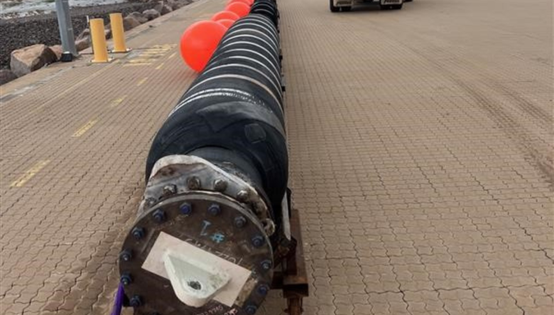 Floating offtake hose on the dock in Darwin, ready to be drained and shredded