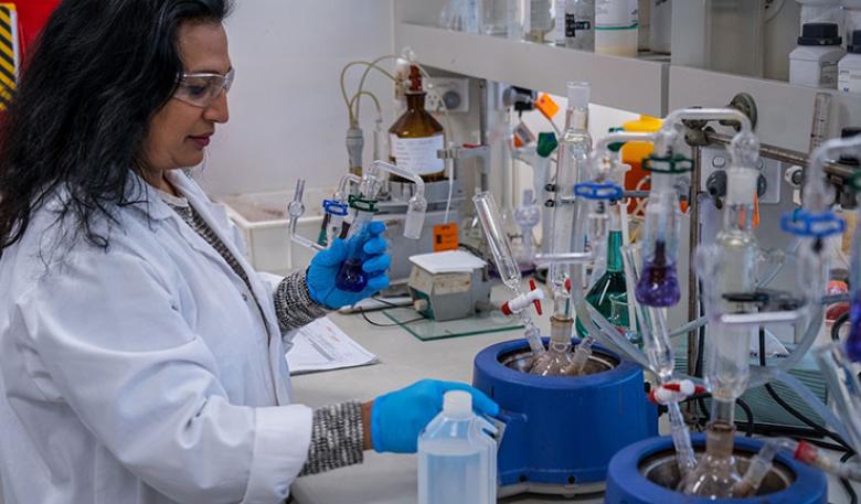 A woman working in a laboratory