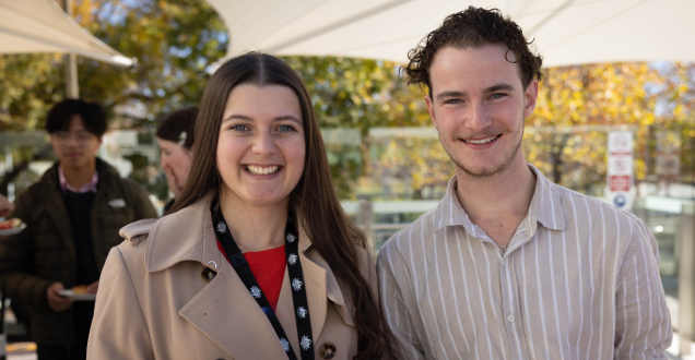 Young man and woman at an outdoor event