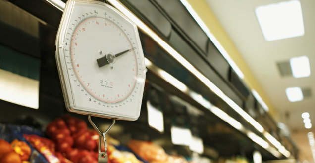 Fresh vegetables sold by weight in a supermarket
