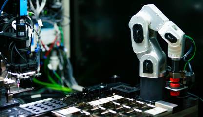 A robotic arm manufacturing optical switching technology.