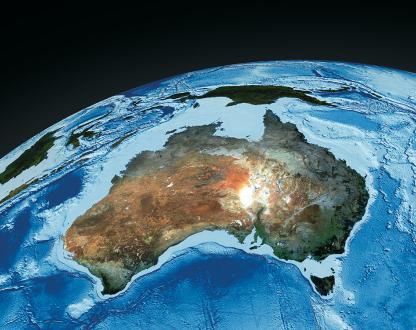 Satellite photo of Australia with swirling ocean.